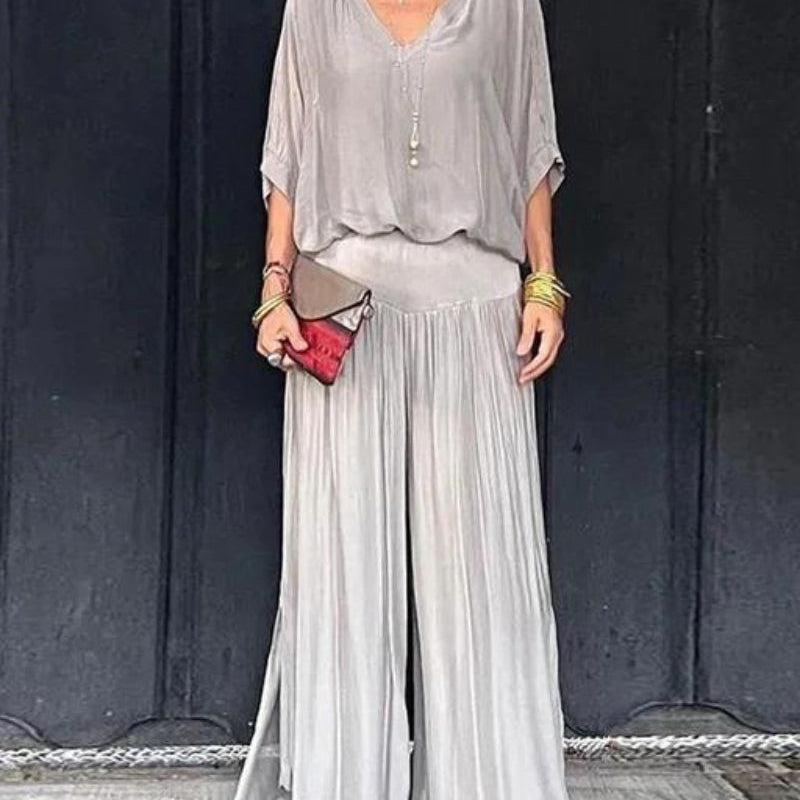 Astride – Elegantni komplet sa bluzom i širokim pantalonama